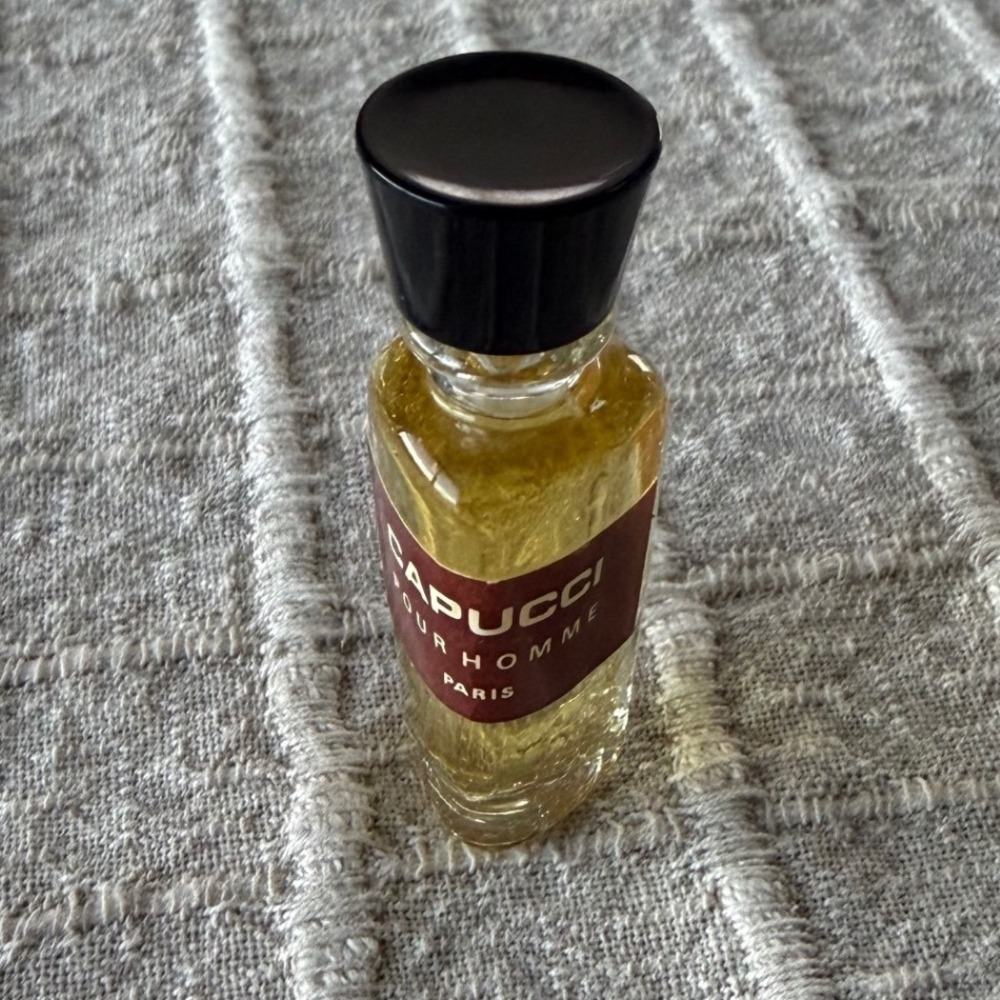 vintage miniature bottle of Capucci Pour Homme by Roberto Capucci